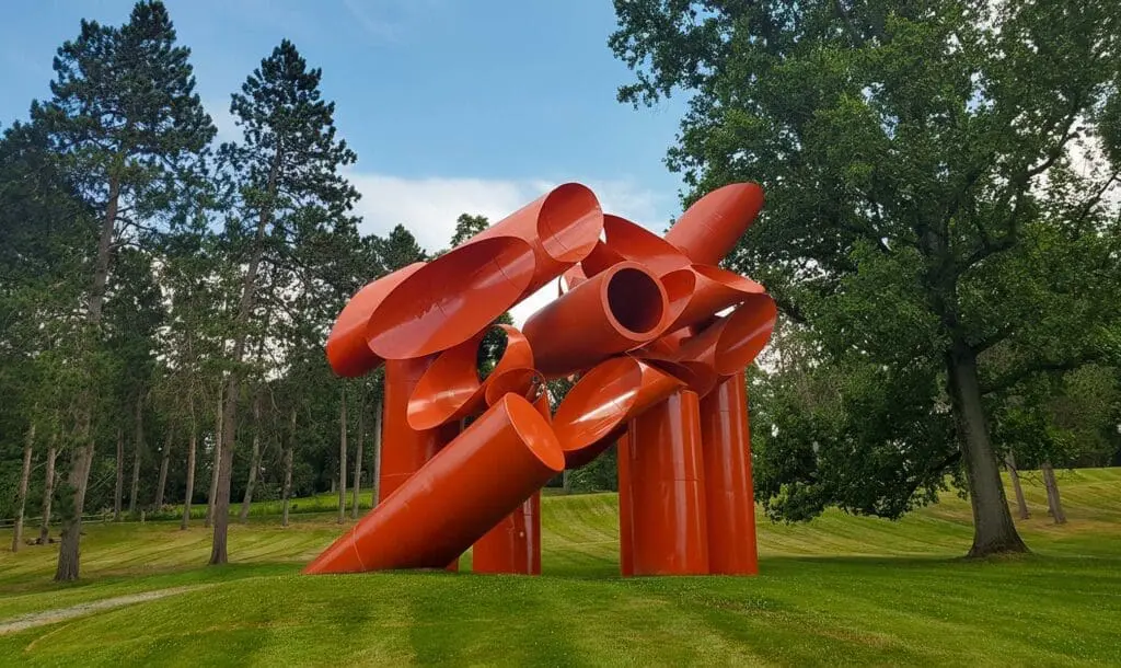 Storm King Art Center sculptures against mountain backdrop